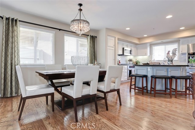 The open floor plan from the formal dining area to the kitchen make this a perfect place for family and friends to gather!