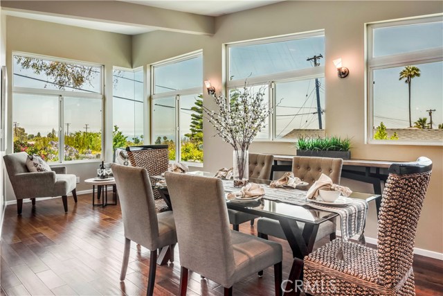 Dining room and sitting area take advantage of the ocean and Catalina views