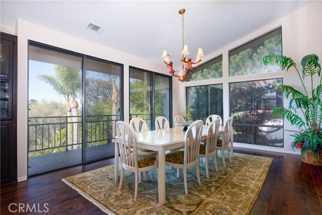 Dinner with a view? check! This dining room is light a bright and offers access to the terrace and ocean views to enjoy with your mean