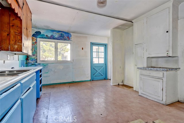 kitchen with door leading out couryard