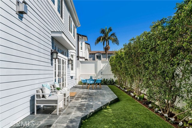 Room to relax, play on the turf and enjoy the privacy with lush landscaping that was a priority of the owners.