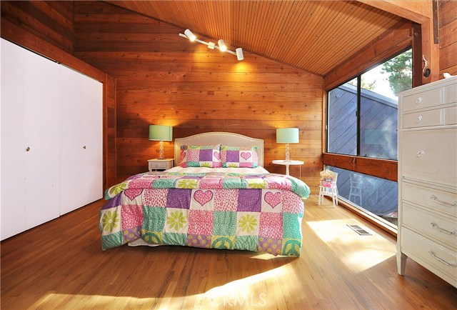 Bedroom 2 with vaulted ceiling