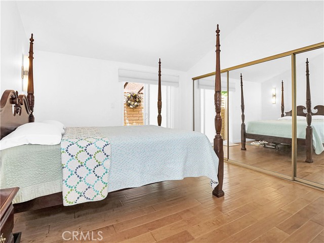 Three mirrored closets in master bedroom with adjacent patio.