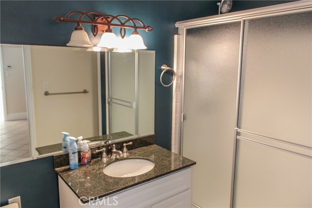 414 A: Master bedroom bath.  Granite counter top.