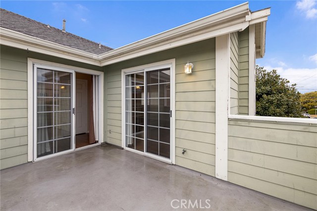 Patio off the living room with two entrances.