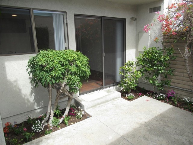 REAR PATIO ENTRANCE FROM GARAGE.