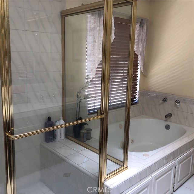 The master bath not only has a separate shower with a seat, but a spa tub for a relaxing soak!