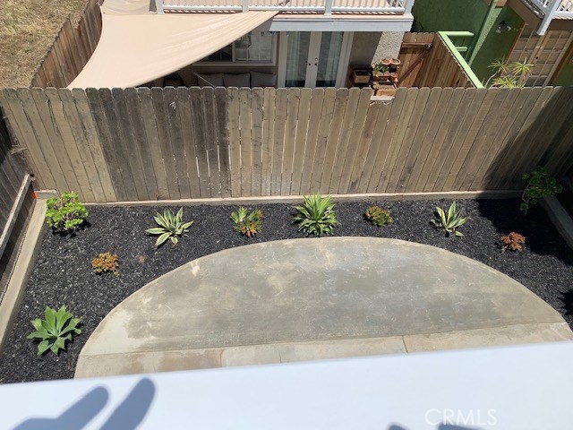 View of backyard from Master Bedroom balcony.