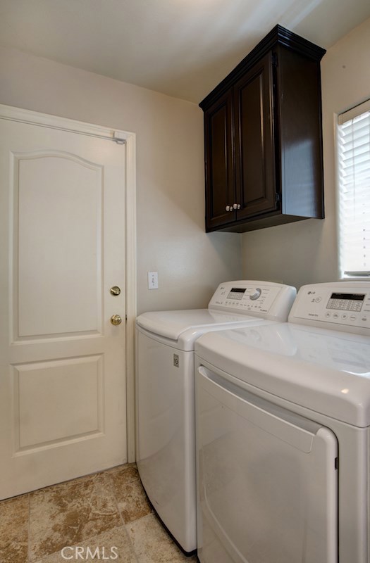 Laundry room adjacent the kitchen