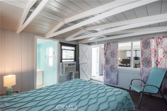 Bonus Bedroom with door to 3/4 Bathroom looking into Living area