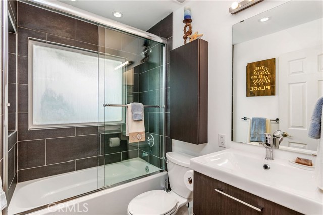 Beautifully remodeled guest bath.