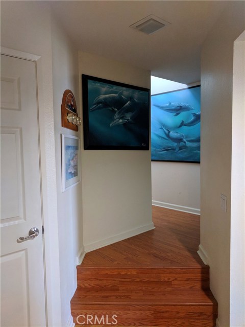 Bottom of Stairway with Large Closet to left