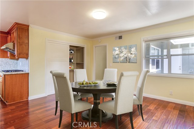 Virtually Staged Dining Area off Kitchen with Pantry