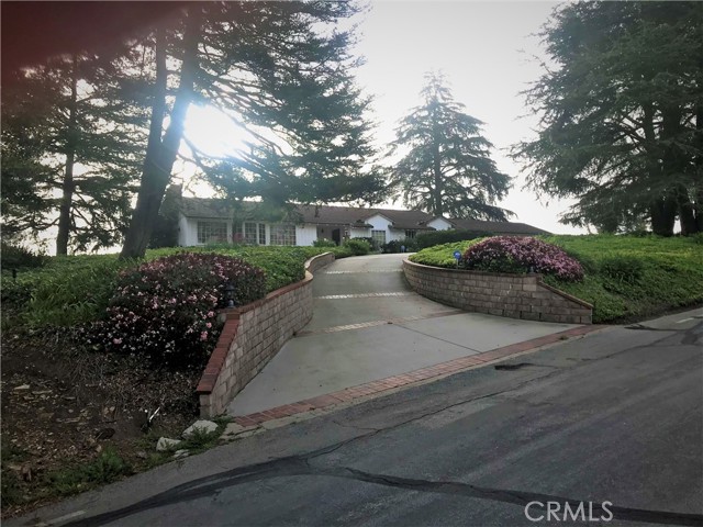 Street view of circular driveway entrance