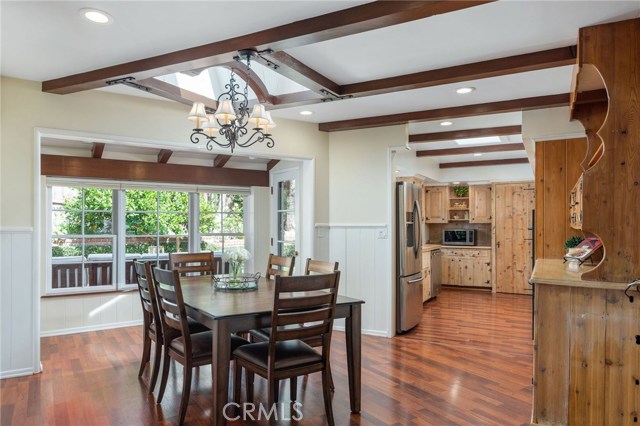 The dining area is at the heart of the home and looks out into the natural backdrop of the outdoors.