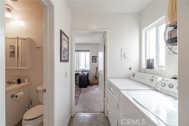 Upstairs bath, laundry and 3rd bedroom