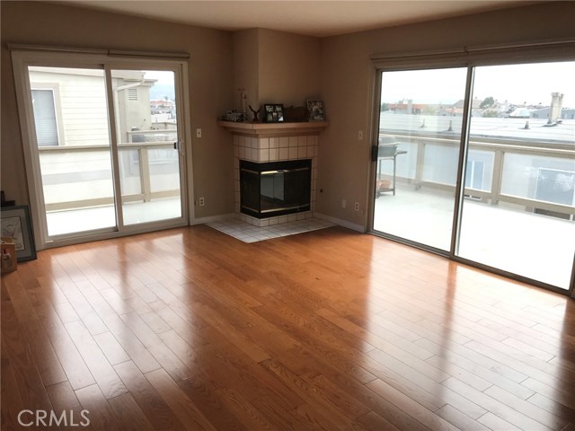 Living Room, Fireplace and large wraparound deck