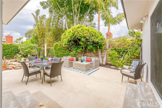 Spacious patio and backyard accessed from Living room and Family room