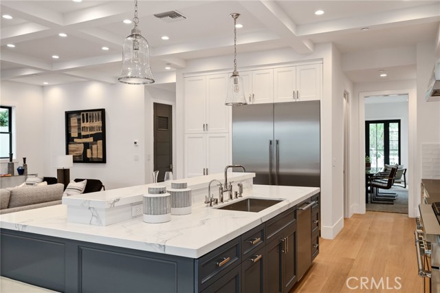 Designer finishes, premium appliances and masterful function featured