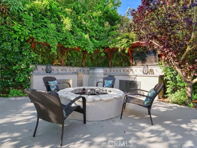 Outdoor kitchen with a fire pit