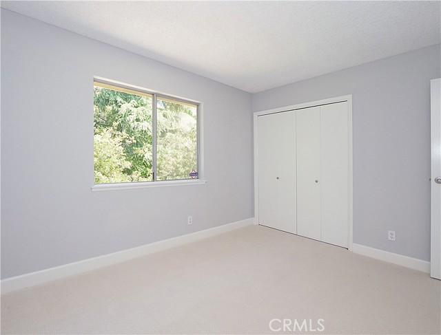 Bedroom 4 view to greenery and double closet Bedroom 4 view to greenery and double closet