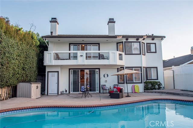 Privacy abounds in this fun family back yard... this is a big back yard with plenty of space... This photo captures the pool but there is plenty of room to hang out as well!