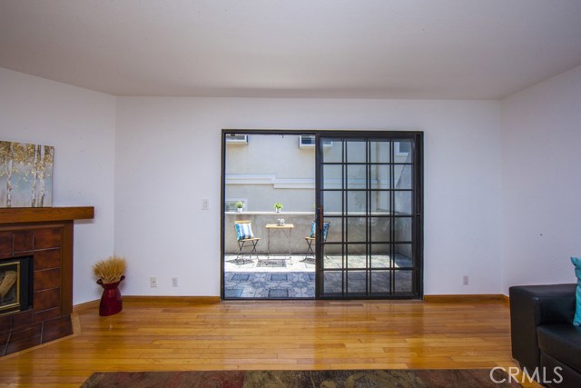 Sliding glass doors leading out to balcony.