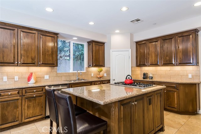 Large center island is the perfect spot for a bite to eat!