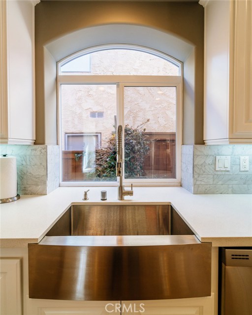 Large farmhouse sink, one of two in the kitchen.