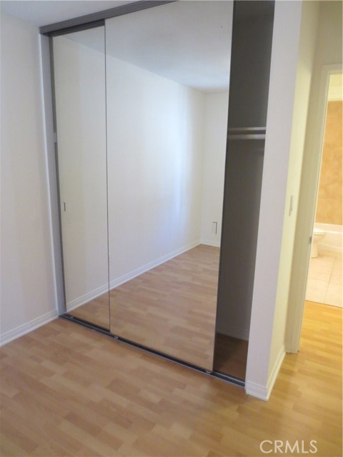 Bedroom 1 wood floors in closet