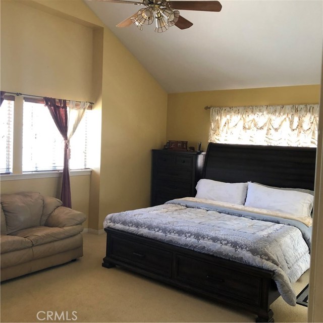 Talk about a huge master bedroom... it has room for a sofa & then some!