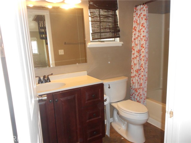 Downstairs full bath, shower over tub.