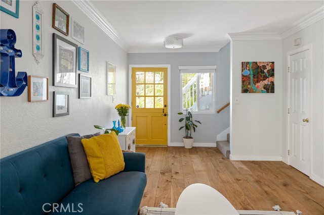 Living room also includes a big hall closet with plenty of storage under the stairs