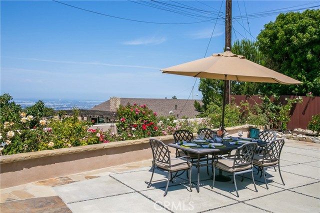 Perfect for entertaining, patio overlooking rose garden and ocean, city lights and mountain views.