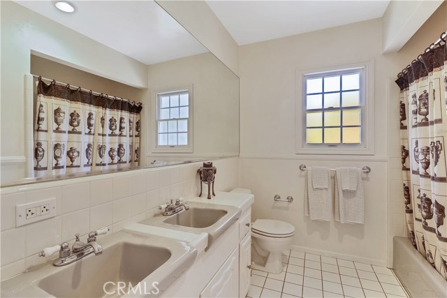 Full Bath off of the Kitchen and between Bedrooms 3 and 4