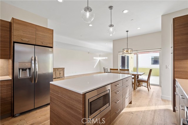Open concept so can still mingle with your guests while prepping in the kitchen