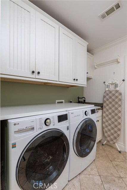 Partial view of the laundry/utility room.