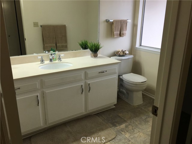 Master bathroom with stall shower on left side of photo