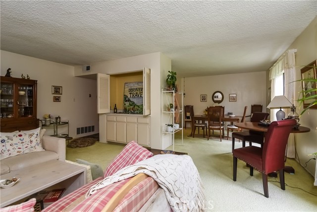 Family room. wet bar. and dining area