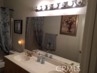 Guest bathroom with dual sinks