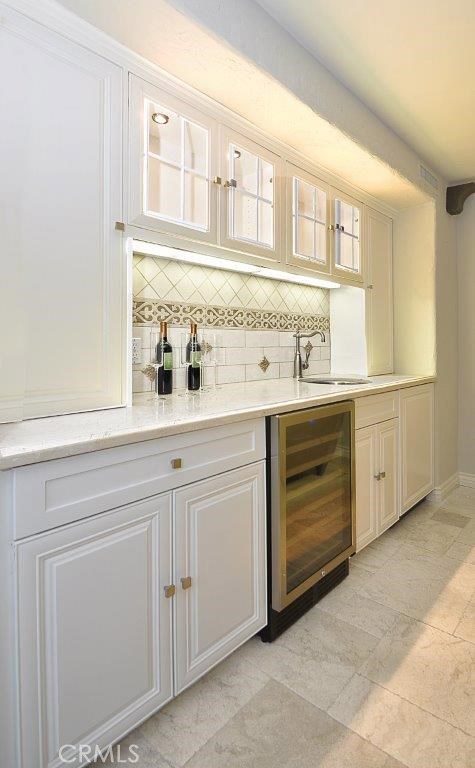 Wet Bar in Family Room has Wine Fridge