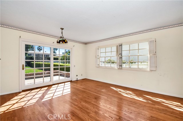 Family room dining area opens to backyard patio and expansive yard