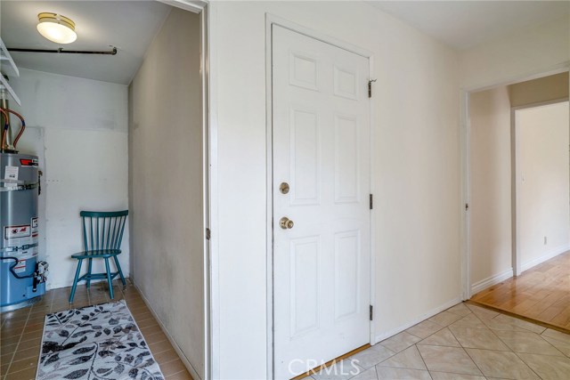 BACK HOUSE:  LAUNDRY AT THE LEFT DOOR AND DIRECT GARAGE ACCESS TO THE DOOR ON THE RIGHT. MASTER DOWN THE HALL WITH 3/4 BATHROOM