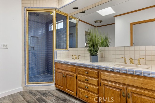 Master bath has a separate shower and tub