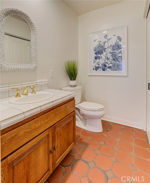 Powder room with laundry closet