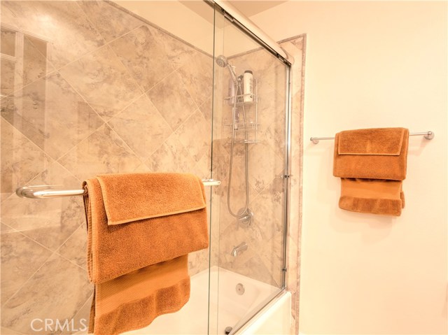 Recently remodeled master bath with frameless shower door and new tile