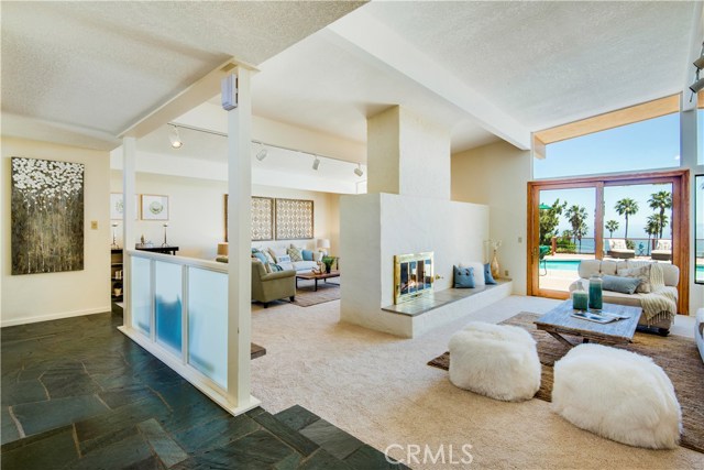 View, view view, the floor to ceiling windows in this Mid-Century modern take advantage of the spectaular view.