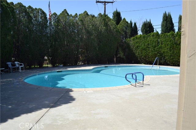 Pool area, located directly north of subject property.