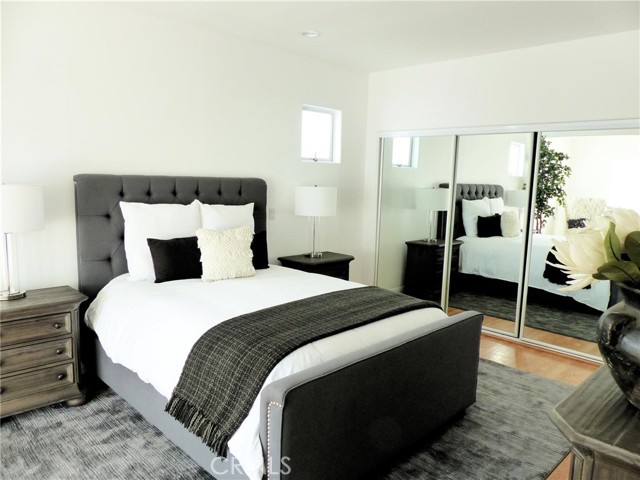 Master bedroom with one set of closets. There is an additional walk-in closet