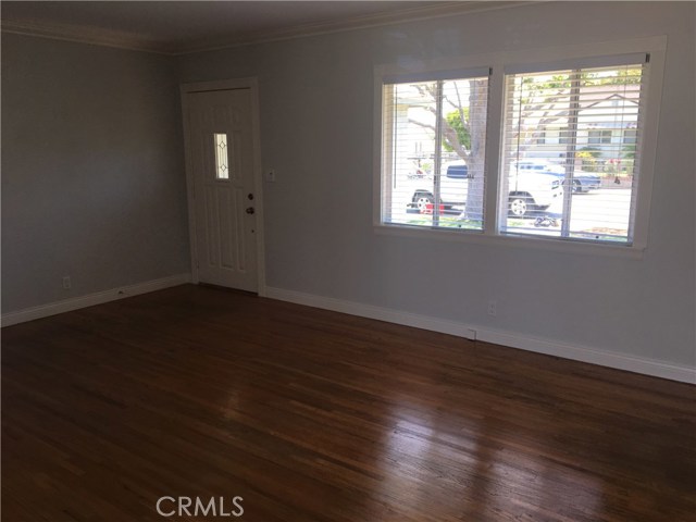 Gleaming hardwood flooring!  Crown moldings and baseboards in the Living room!